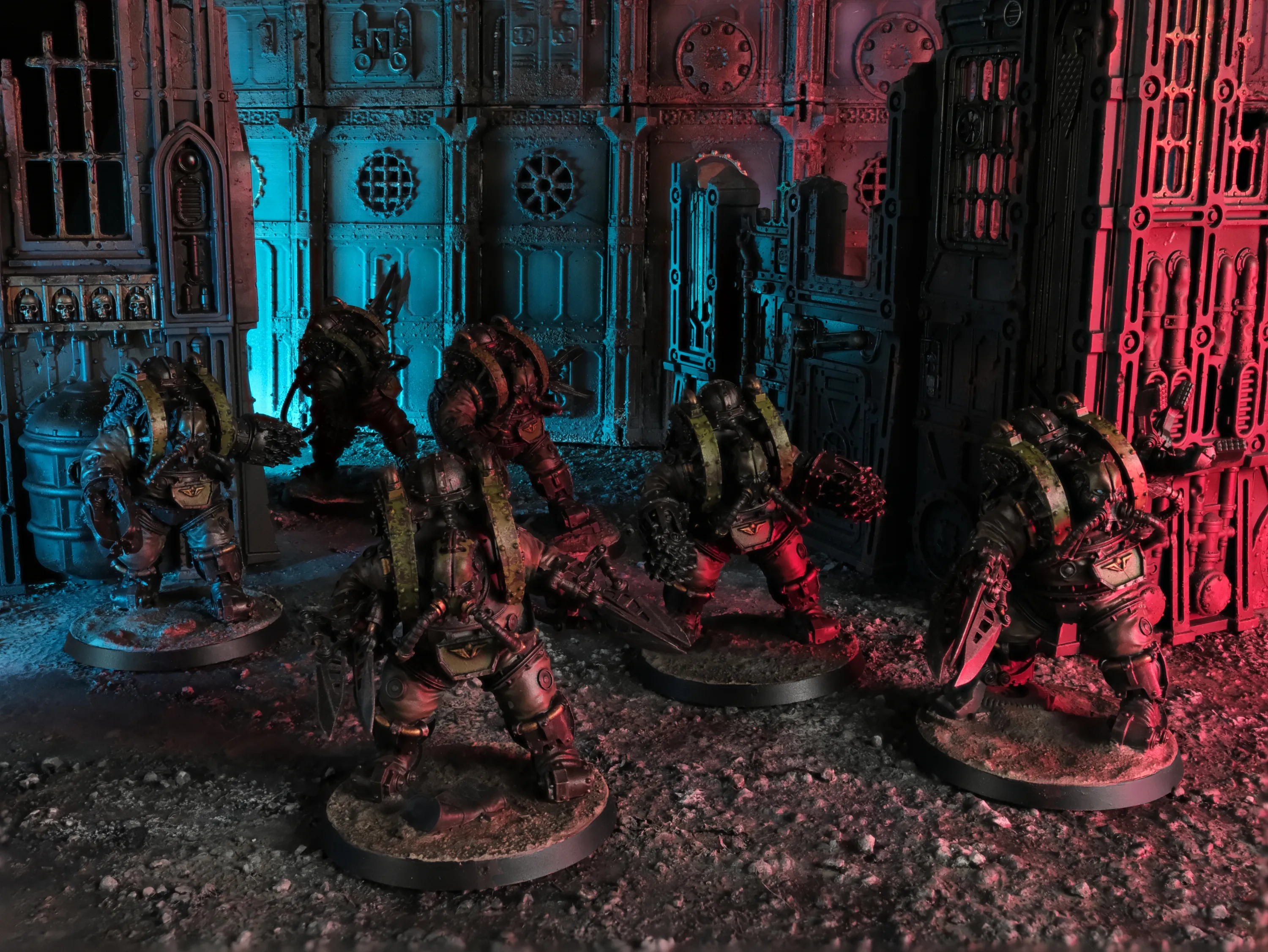 Six Charonite Ogryns of the Wild Hunt of Hibernia moving through ruined terrain